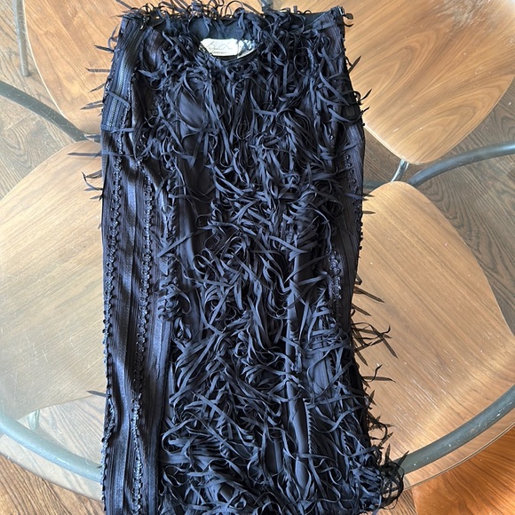 Stunning black frilly knee length skirt. By Byron Lars. “Beauty Mark” size: 4